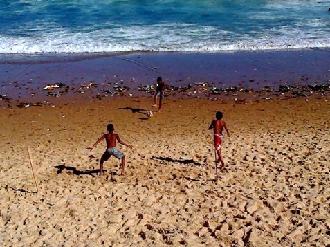 A soothing picture of kids playing footie on the beach to take my mind off the evening...